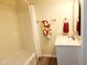 Clean bathroom with a shower, vanity, and a modern mirror at 930 W Mackenzie Dr, Phoenix, AZ 85013