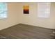 Sunny bedroom with modern flooring, and neutral color scheme at 930 W Mackenzie Dr, Phoenix, AZ 85013