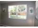 Bright bedroom with large windows offering a view of the outside, and natural lighting at 930 W Mackenzie Dr, Phoenix, AZ 85013