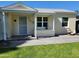 Charming single-story home with a well-manicured lawn and inviting front porch at 930 W Mackenzie Dr, Phoenix, AZ 85013