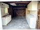 Garage interior featuring storage cabinets and open space at 930 W Mackenzie Dr, Phoenix, AZ 85013