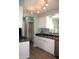Bright kitchen with modern cabinetry, stainless steel appliances and sleek countertops at 930 W Mackenzie Dr, Phoenix, AZ 85013