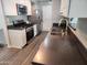Updated kitchen featuring stainless steel appliances and a modern countertop sink and faucet at 930 W Mackenzie Dr, Phoenix, AZ 85013