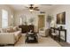 Elegant living room with neutral tones, modern decor, and ample natural light, creating a welcoming space at 930 W Mackenzie Dr, Phoenix, AZ 85013