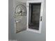 A vintage milk door showcasing its antique receiver with package instructions and storage at 930 W Mackenzie Dr, Phoenix, AZ 85013