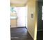 Entryway features a bright room with windows, storage, and an exterior door at 930 W Mackenzie Dr, Phoenix, AZ 85013