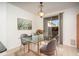 Cozy dining area with glass table, modern chairs, and sliding glass door to patio at 1024 E Frye Rd # 1090, Phoenix, AZ 85048