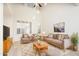 Bright living room featuring high ceilings, large windows, and modern neutral decor at 1024 E Frye Rd # 1090, Phoenix, AZ 85048