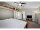 Bright bedroom with spacious layout features a large bed and easy access to closet and living space at 11840 N 59Th Ln, Glendale, AZ 85304