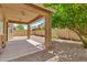 Backyard featuring a covered patio and low maintenance gravel landscaping at 121 W Hackberry Dr, Chandler, AZ 85248