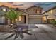 Inviting two-story home boasting a well-manicured front yard and an attached two-car garage at 121 W Hackberry Dr, Chandler, AZ 85248