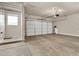 Spacious two car garage with high ceilings, ready for storage and vehicles at 121 W Hackberry Dr, Chandler, AZ 85248