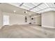 Spacious two car garage with high ceilings, ready for storage and vehicles at 121 W Hackberry Dr, Chandler, AZ 85248