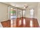 Bright living room boasts hardwood floors, backyard access, and neutral colors at 121 W Hackberry Dr, Chandler, AZ 85248