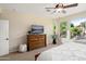 A calming bedroom, showcasing ample natural light from the surrounding windows and neutral colors at 12780 W Desert Vista Trl, Peoria, AZ 85383