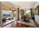 Bright dining room with sliding doors to a covered patio, blending indoor and outdoor living spaces at 12780 W Desert Vista Trl, Peoria, AZ 85383