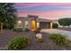 Charming single-story home with a well-manicured front yard and desert landscaping at 12780 W Desert Vista Trl, Peoria, AZ 85383