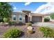Inviting single-story home featuring desert landscaping with a cactus accent at 12780 W Desert Vista Trl, Peoria, AZ 85383