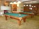 Community game room featuring billiard tables, comfortable seating, and decorative lighting at 12780 W Desert Vista Trl, Peoria, AZ 85383