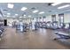 Spacious gym area with a variety of fitness equipment and natural light at 12780 W Desert Vista Trl, Peoria, AZ 85383