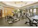 Well-equipped gym with modern exercise machines, mirrored walls, and bright lighting at 12780 W Desert Vista Trl, Peoria, AZ 85383