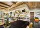 Large kitchen with an island, stainless steel appliances, and wooden ceiling detail at 12780 W Desert Vista Trl, Peoria, AZ 85383