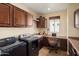 Spacious laundry room with built in desk and generous cabinet space at 12780 W Desert Vista Trl, Peoria, AZ 85383
