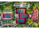 Aerial view of multiple well-maintained tennis courts surrounded by lush landscaping at 12780 W Desert Vista Trl, Peoria, AZ 85383
