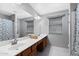 Bathroom featuring double sinks and a large mirror at 1381 N Alexis Dr, Gilbert, AZ 85234