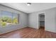 Bedroom with wood floors, natural light and a closet at 1381 N Alexis Dr, Gilbert, AZ 85234