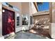 Cozy front porch featuring a seating area, creating a welcoming entrance to the home at 1381 N Alexis Dr, Gilbert, AZ 85234