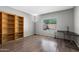 Room with wood floors and a view to the pool at 1381 N Alexis Dr, Gilbert, AZ 85234