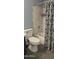 Updated bathroom featuring a shower with patterned curtain at 14620 N 31St Ln, Phoenix, AZ 85053