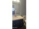 Clean bathroom with modern sink vanity and toilet, complemented by neutral tones at 14620 N 31St Ln, Phoenix, AZ 85053