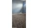 Empty bedroom featuring soft carpeting and natural lighting at 14620 N 31St Ln, Phoenix, AZ 85053