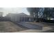 Well-maintained home featuring a cozy, covered porch, a mature shade tree, and low maintenance front yard at 14620 N 31St Ln, Phoenix, AZ 85053