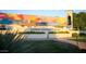 Surprise Regional Library features colorful mural art, modern architecture, clock tower, and well-maintained landscaping at 15635 W Hackamore Dr, Surprise, AZ 85387