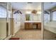 Bright bathroom with a double sink vanity, soaking tub, and shower at 17374 W Adams St, Goodyear, AZ 85338