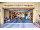 Spacious garage with ample storage and shelving, offering organized space at 17374 W Adams St, Goodyear, AZ 85338