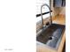 Close-up of a stainless steel kitchen sink with a modern faucet and bright natural light at 1961 N Hartford St # 1109, Chandler, AZ 85225