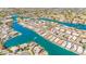 Aerial view capturing waterfront homes with landscaped yards, enhancing the neighborhood's charm at 2094 N Sweetwater Dr, Casa Grande, AZ 85122