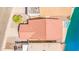 Overhead view of a single Gathering home with a red tiled roof, adjacent to a tranquil lake and pool at 2094 N Sweetwater Dr, Casa Grande, AZ 85122