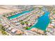 Extensive aerial view showcasing an expansive community, serene lakes, and well-maintained landscaping at 2094 N Sweetwater Dr, Casa Grande, AZ 85122