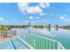 Back patio with lake view, showcasing the beautiful waterfront living at 2094 N Sweetwater Dr, Casa Grande, AZ 85122