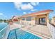 Waterfront backyard boasts a patio and direct access to the lake at 2094 N Sweetwater Dr, Casa Grande, AZ 85122