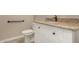 Bathroom showcasing granite countertop, white cabinets, and modern fixtures at 2111 N Piper Pl, Mesa, AZ 85215