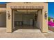 Open garage with room for storage, workbench, and work space at 2111 N Piper Pl, Mesa, AZ 85215
