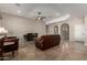 Spacious living room boasts tile floors, recessed lighting, and neutral wall paint at 2111 N Piper Pl, Mesa, AZ 85215
