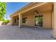 Large covered patio with ceiling fan and outdoor TV at 2111 N Piper Pl, Mesa, AZ 85215