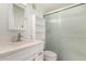 Bright bathroom featuring a vanity, sink, and stall shower at 2524 W Kiva Ave, Mesa, AZ 85202